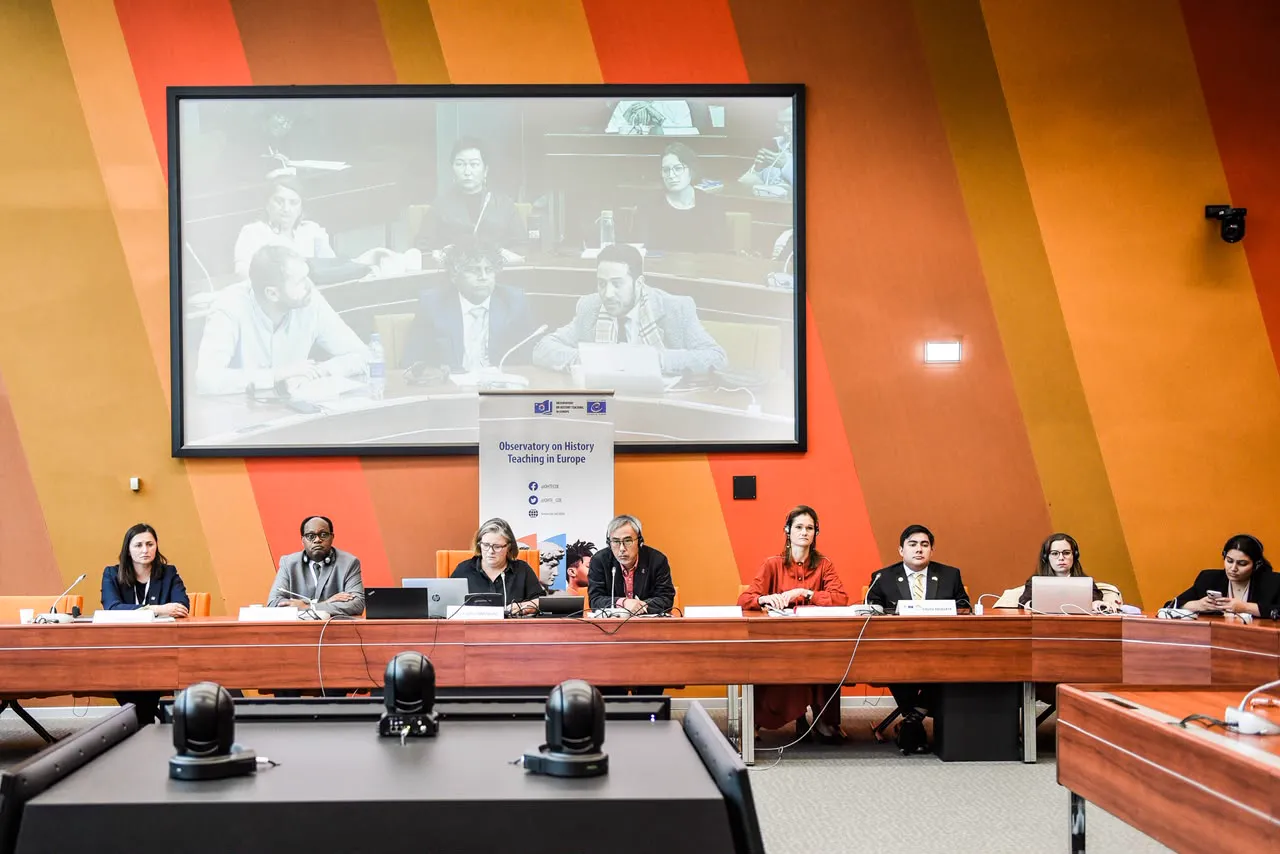 Speakers at a conference panel